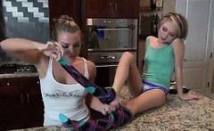 Lesbian Kisses And Licks Feet In The Kitchen