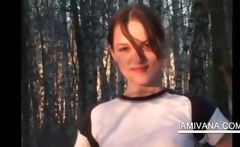 Sweet Ivana takes of undies in snowy woods