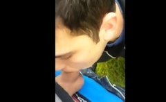 Twink sucking cock in the park and getting the cum