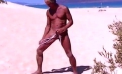 Tanned Guy On Beach In Tiny String Thong (temporarily!)