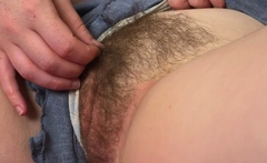 Freckled redhead toys her hairy cunt